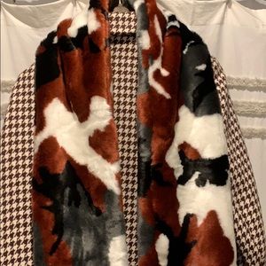 Faux fur scarf in burgundy, black, white and grey.